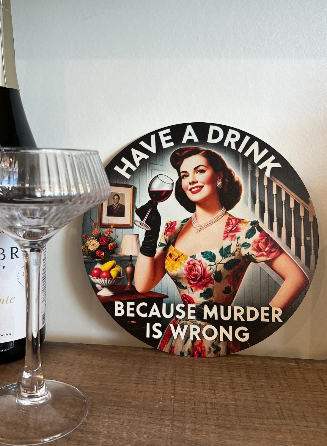 Vintage sign that reads, have a drink because murder is wrong