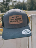 Hold my beer and watch this, heather grey hat with a back back, front view
