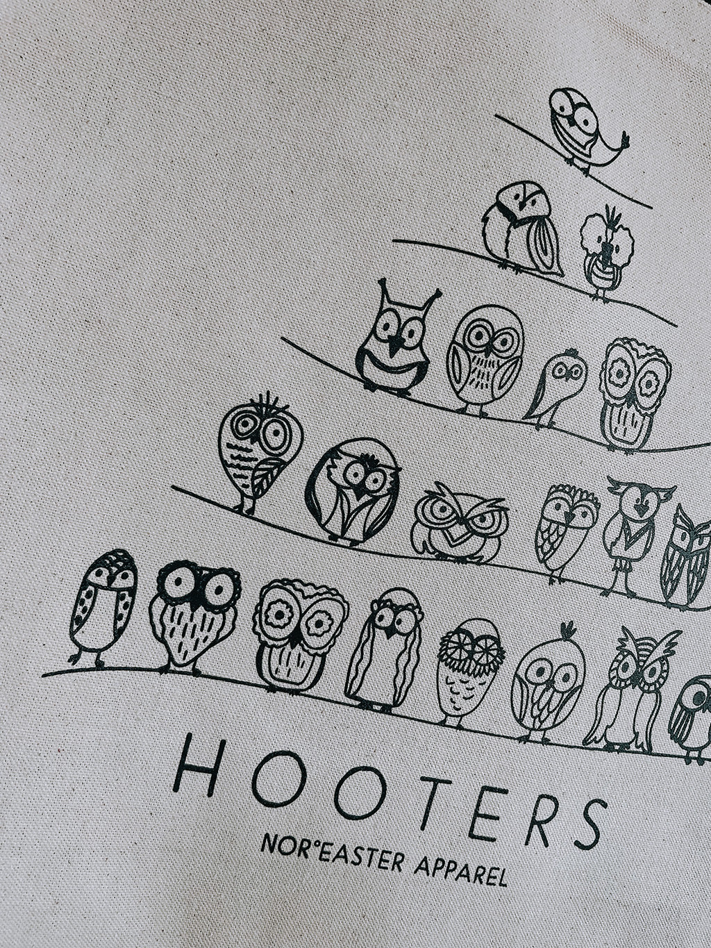 hooters tote bag detail of owls in black ink