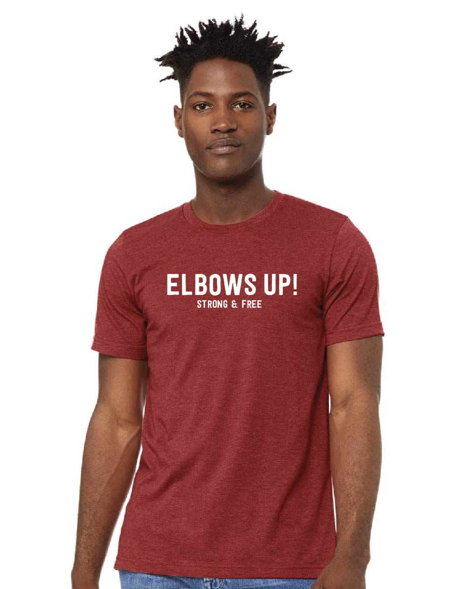Elbows Up! Red crewneck t-shirt front view on a man, front view.