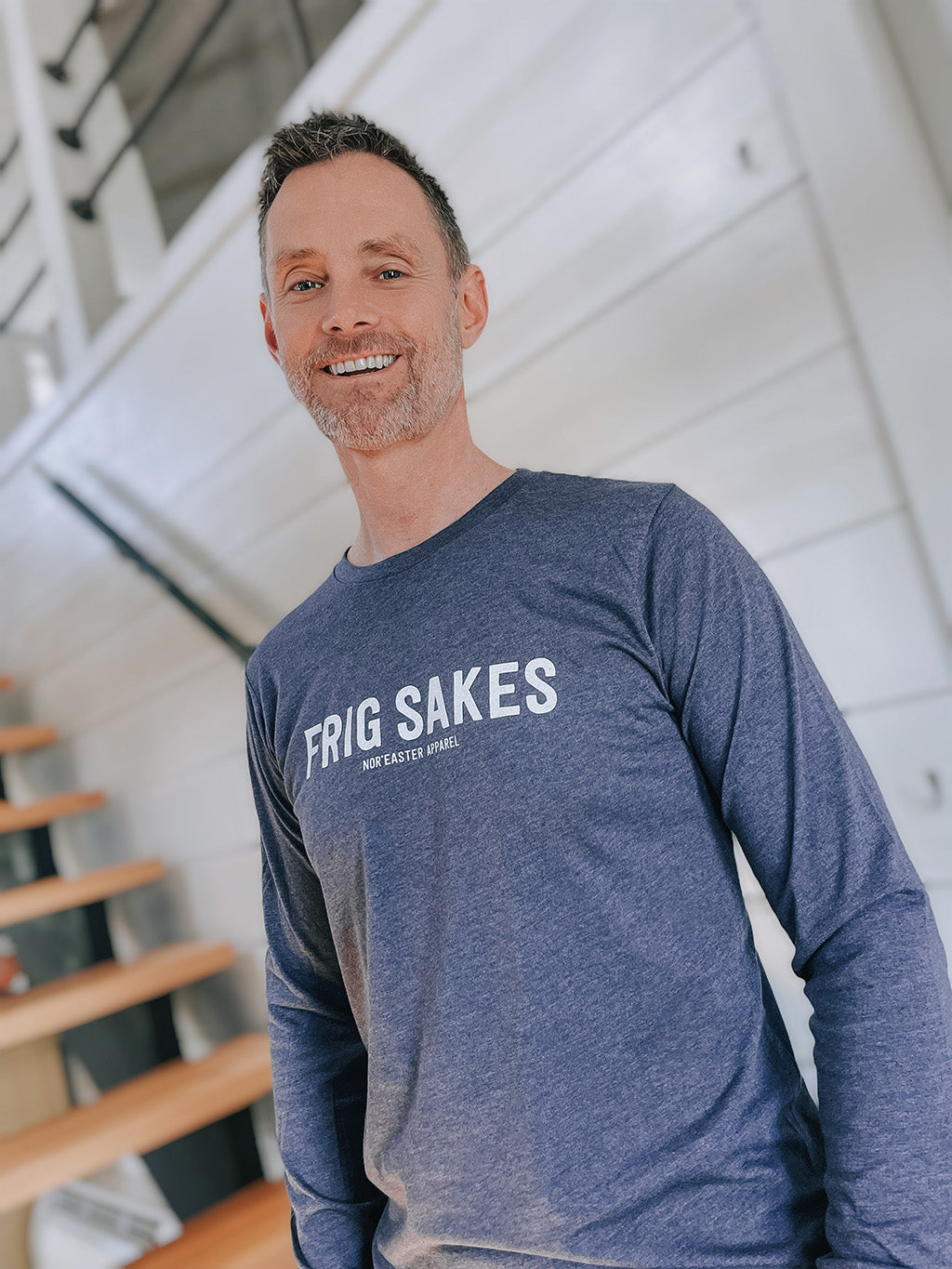 Frig Sakes Long Sleeve T-Shirt front view on a guy