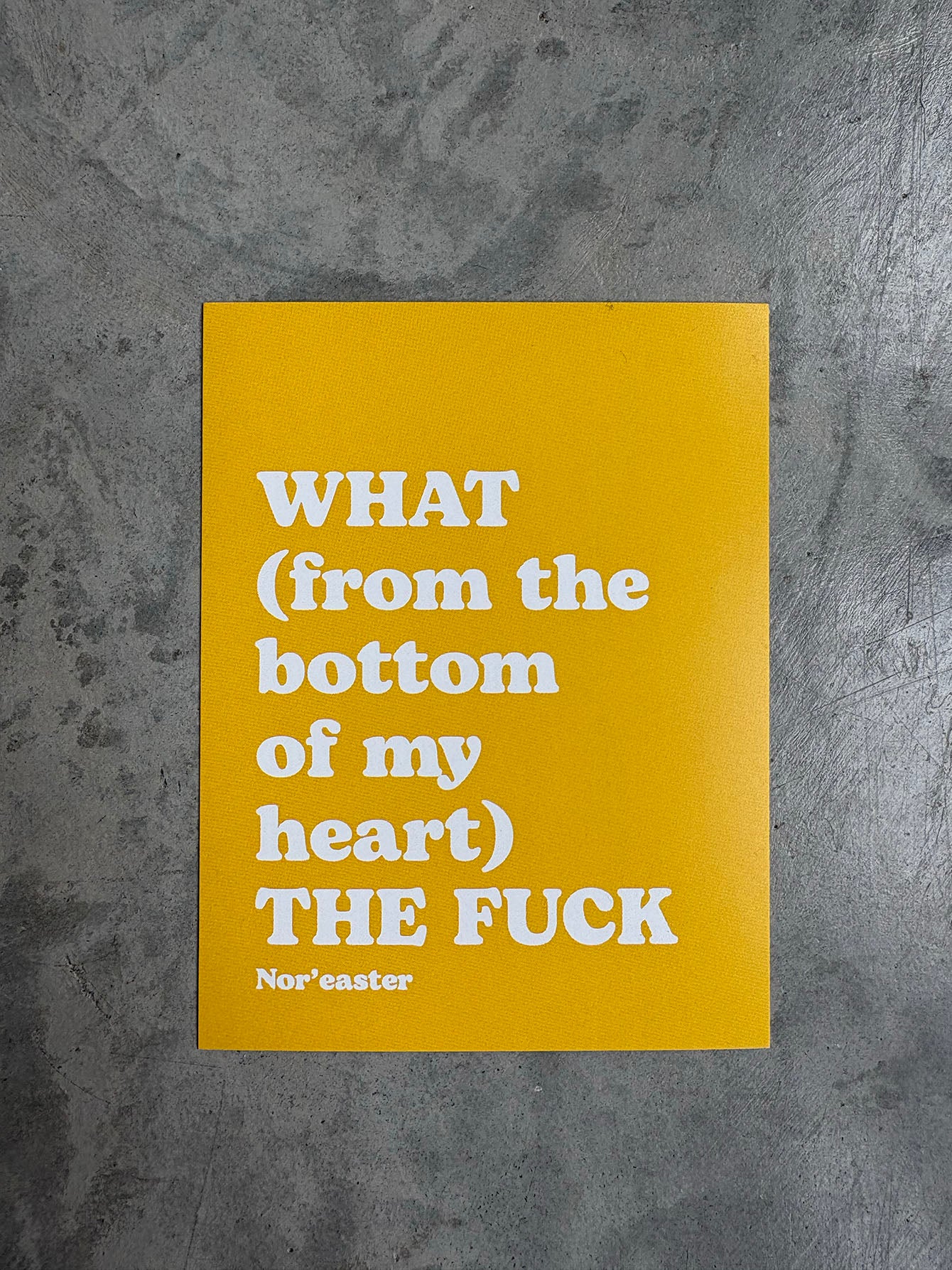 Yellow poster with white text on a gray textured background