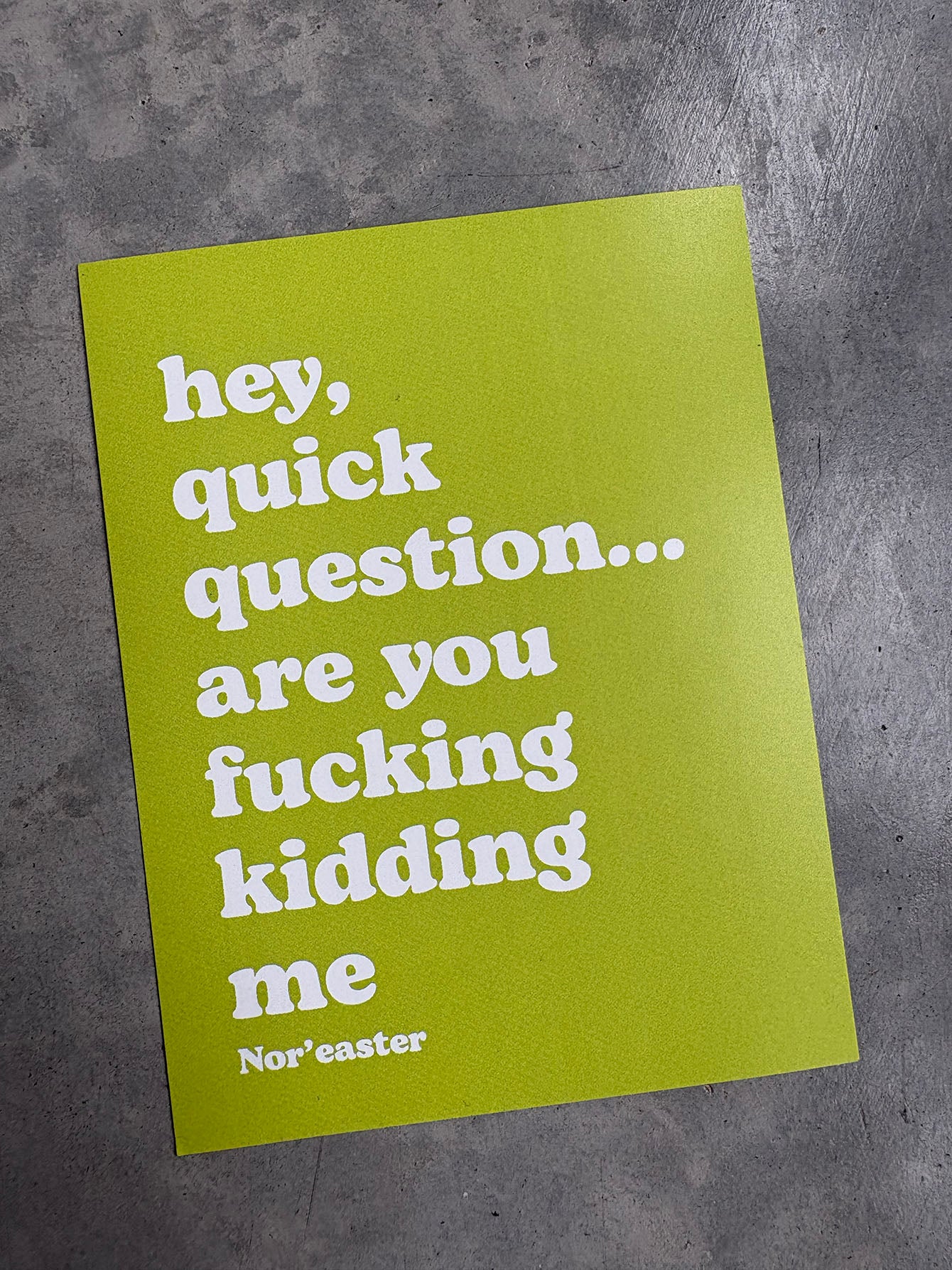 Green poster with white text on a gray background