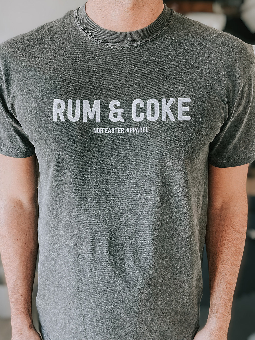 nor'easter apparel rum and coke t-shirt on a man close view