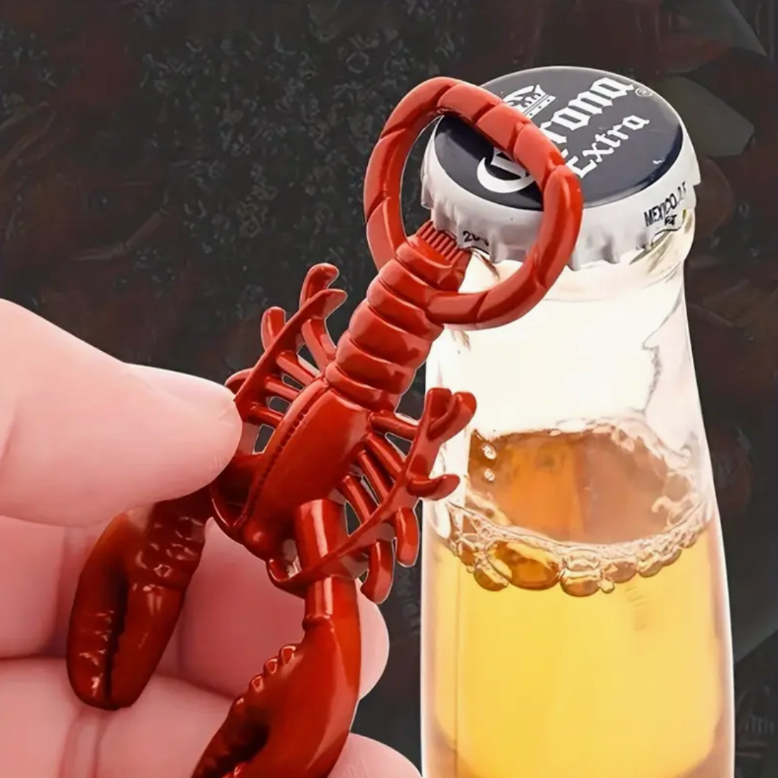 Red metal lobster bottle opener. 