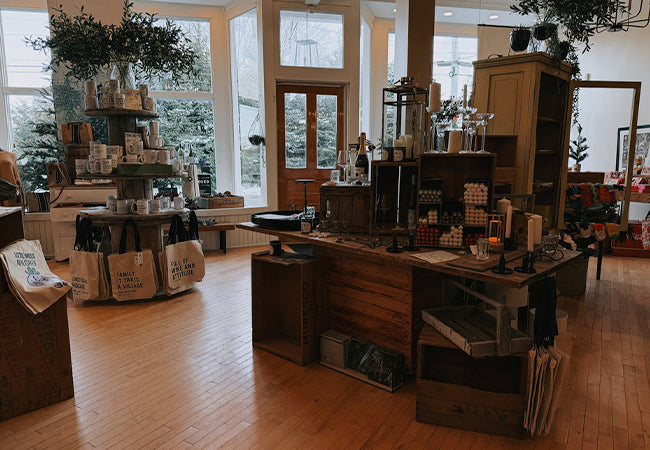 Wooden furniture store with various items on display